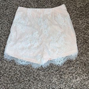 White lace shorts